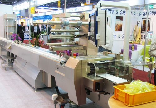 속도가 생명! 3면 포장 분당 400개