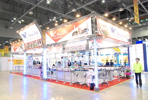 [2012 서울국제포장전 현장스케치] ㈜우진자동화, 지속적인 품목 개발과 품질향상을 최우선으로 하는 물류자동화 기업