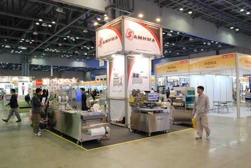[2012 서울국제포장전 현장스케치] 삼화포장기계, 실용적이면서도 뛰어난 품질의 식품자동화 기계 생산